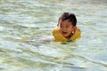 Swiming Japanese boy Royalty Free Stock Photo
