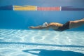 Swimmer in crawl style underwater Royalty Free Stock Photo