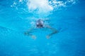 Swimmer excercise on indoor swimming poo Royalty Free Stock Photo