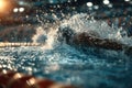 Swimmer executing a dive into a competition pool showcasing skill and determination Royalty Free Stock Photo