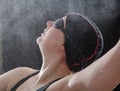 Swimmer with glasses swims on her back Royalty Free Stock Photo