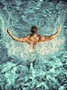 Swimmer man swim in blue water pool Royalty Free Stock Photo