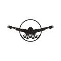 Swimmer Silhouette in a circle logo applied for sports activity or sports shop. Royalty Free Stock Photo