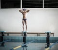 Swimmer standing on starting block Royalty Free Stock Photo