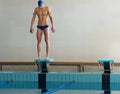 Swimmer standing on starting block Royalty Free Stock Photo