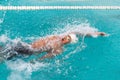 Swimmer swimming backstroke Royalty Free Stock Photo
