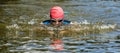 Swimmer is swimming breaststroke