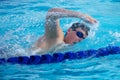 Swimmer Taking a Quick Breath Doing Freestyle Royalty Free Stock Photo