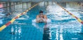 Swimmer using breaststroke drills during a swim training session Royalty Free Stock Photo