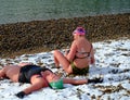 Swimmers on the beach in the snow