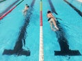 swimmers in lane pool, men in water Royalty Free Stock Photo