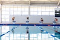 Swimmers plunging in the pool Royalty Free Stock Photo