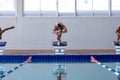 Swimmers plunging in the pool Royalty Free Stock Photo