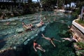 Swimmers relax in the Antique Pool at the ruins of Hierapolis in Pamukkale in Turkey.