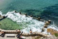 Swimmers and sunbathers enjoying the warm summer weather at the Ross Jones Rockpool