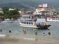 Swimmers and Tour Boats in Acapulco