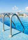 Swimmimg pool with stairs outdoor. Selective focus. Royalty Free Stock Photo