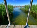 Swimming area with jetty and swim ladder at the Fleesen Lake in Mecklenburg-Vorpommern in Germany