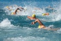 Swimming athletes in a triathlon