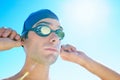 Swimming, blue sky and face of sports man determined for exercise, outdoor workout or training routine. Swimwear