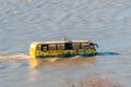 Swimming bus pleasure ship. Boat in the shape of a bus with tourists on Danube river. Danube river travel transportarion. Hungary