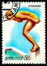 Swimming, diving, female athlete jumps into the water, from series Spor