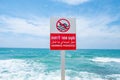 swimming forbidden in english and hebrew at a sign at the beach in Tel Aviv Royalty Free Stock Photo