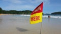 Swimming here sign flaf for security information on the beach