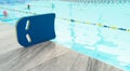 Swimming kickboard on the marble. Royalty Free Stock Photo