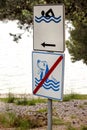 Swimming Permitted sign. No dog allowed sign on sea beach. No dog sign and pets. Forbidden symbol allowed sign prohibited dogs. Royalty Free Stock Photo