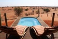 Swimming pool with beautiful view over the Kalahari desert - Namibia Africa Royalty Free Stock Photo