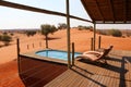 Swimming pool with beautiful view over the Kalahari desert - Namibia Africa Royalty Free Stock Photo