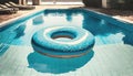 swimming pool with blue inflatable ring