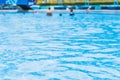 Swimming pool blue water people leisure playing in summer season