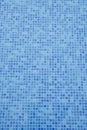 Swimming pool bottom. Close up view of blue mosaic tiles in the pool. Blue abstract ceramic tile. Royalty Free Stock Photo