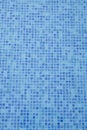 Swimming pool bottom. Close up view of blue mosaic tiles in the pool. Blue abstract ceramic tile. Royalty Free Stock Photo