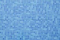 Swimming pool bottom. Close up view of blue mosaic tiles in the pool. Blue abstract ceramic tile. Royalty Free Stock Photo