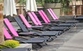 Swimming pool chairs row Royalty Free Stock Photo
