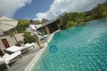 Swimming pool cleaner, professional cleaning service at work. Royalty Free Stock Photo