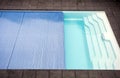 Swimming pool cover detail for protection and heat the water, pool roller-shutter covers Royalty Free Stock Photo