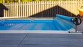 Swimming pool cover for protection against dirt, leaves, heating and cooling water Royalty Free Stock Photo