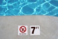 Swimming pool depth marker