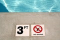 Swimming pool depth marker Royalty Free Stock Photo