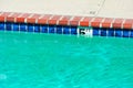 Swimming pool depth marker identifies the water depth for swimmers. Five feet depth sign Royalty Free Stock Photo