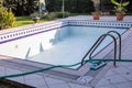 Empty swimming pool end of the summer season Royalty Free Stock Photo