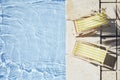 Swimming pool and empty resting chair with shadow. Top view.