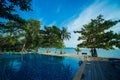 Swimming pool at exotic tropical resort. Exotic garden. Royalty Free Stock Photo