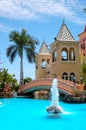 Swimming pool with fountain at luxury hotel Royalty Free Stock Photo