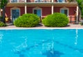 Swimming pool and green platns Royalty Free Stock Photo