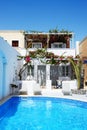 Swimming pool of hotel in traditional Greek style Royalty Free Stock Photo